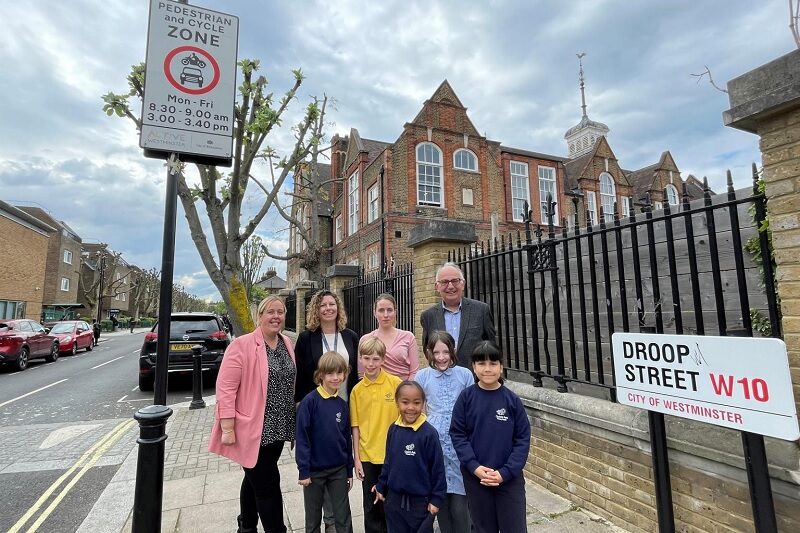 Councillor Paul Dimoldenberg with teachers and pupils at Queen